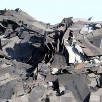 Rooftop Waste Pile Illustrating Environmental Impact Of Roofing Materials