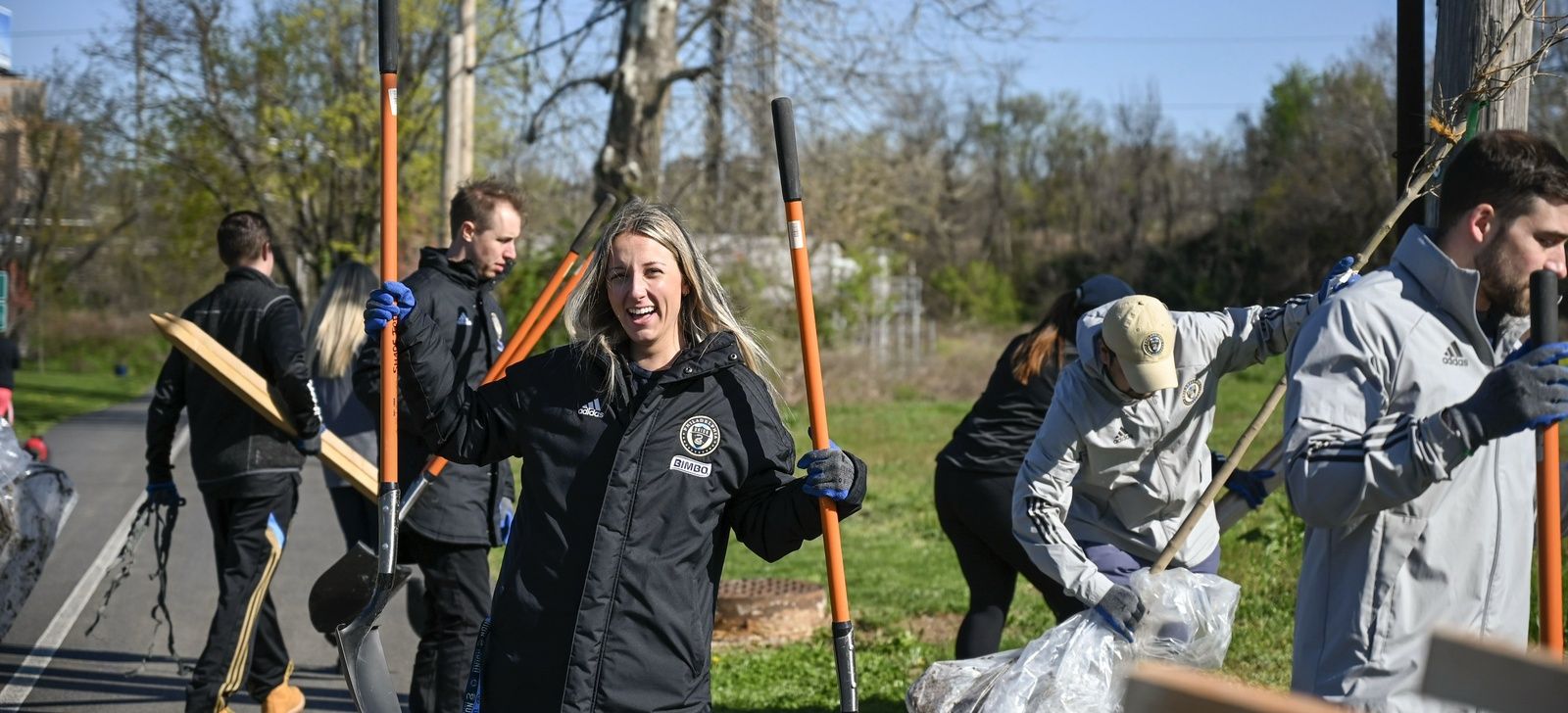 Volunteers Engage In Environmental Cleanup And Restoration Efforts